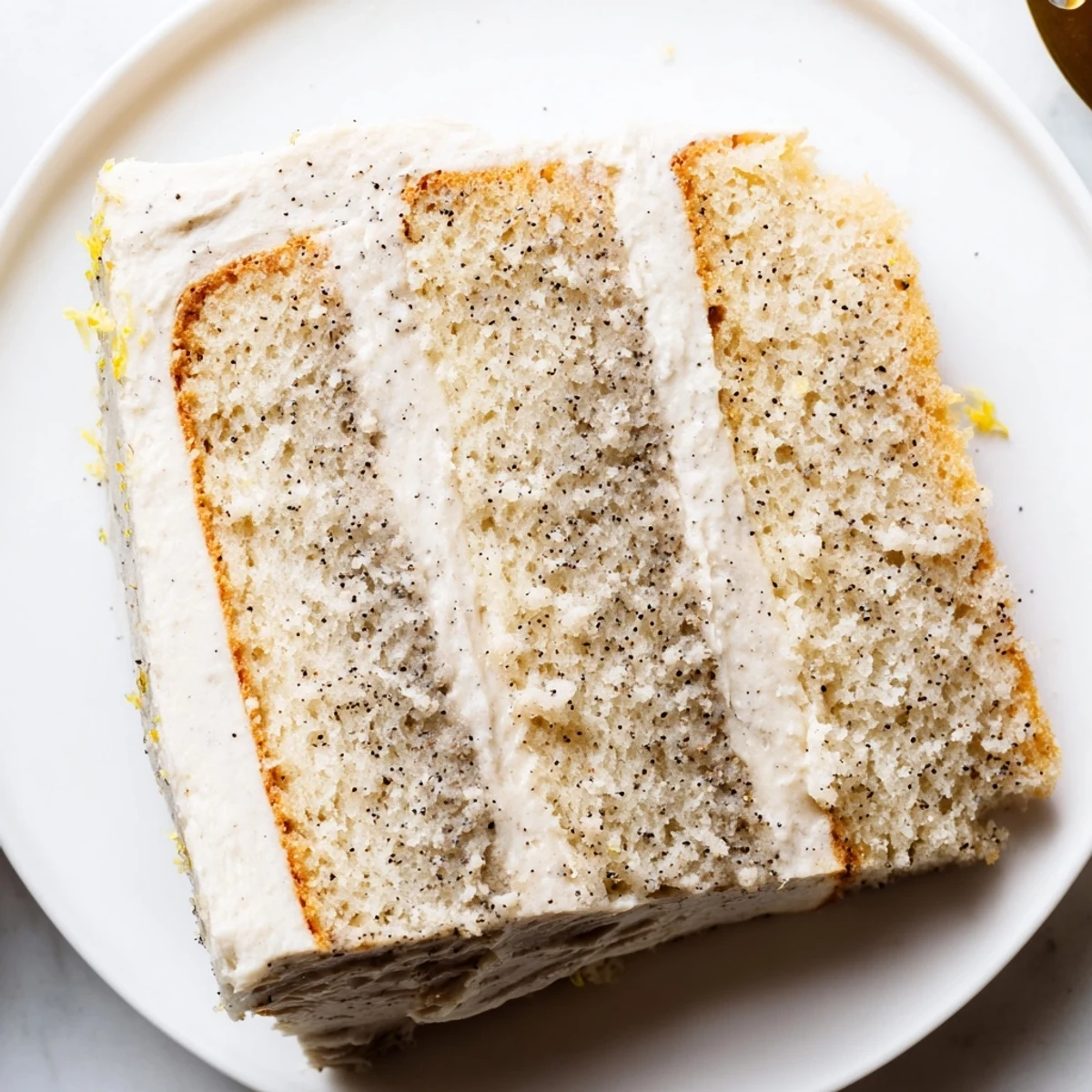 Moist London Fog cake with bergamot-infused sponge topped with silky white vanilla frosting
