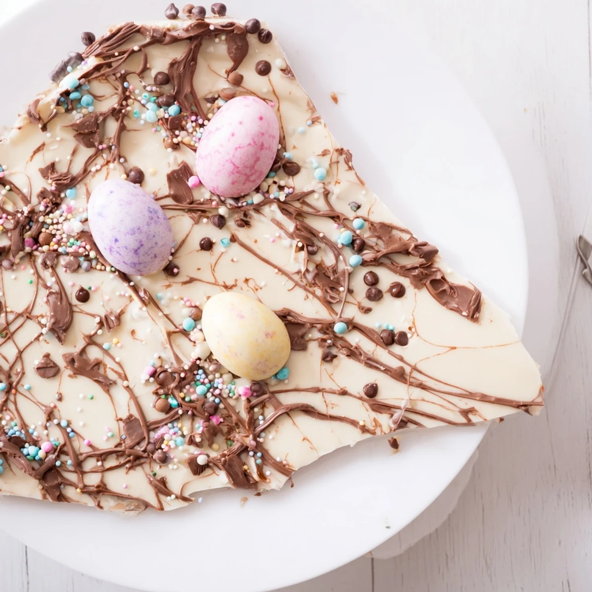 Close-up of Robin Egg Easter Bark broken into pieces, silky chocolate marbling