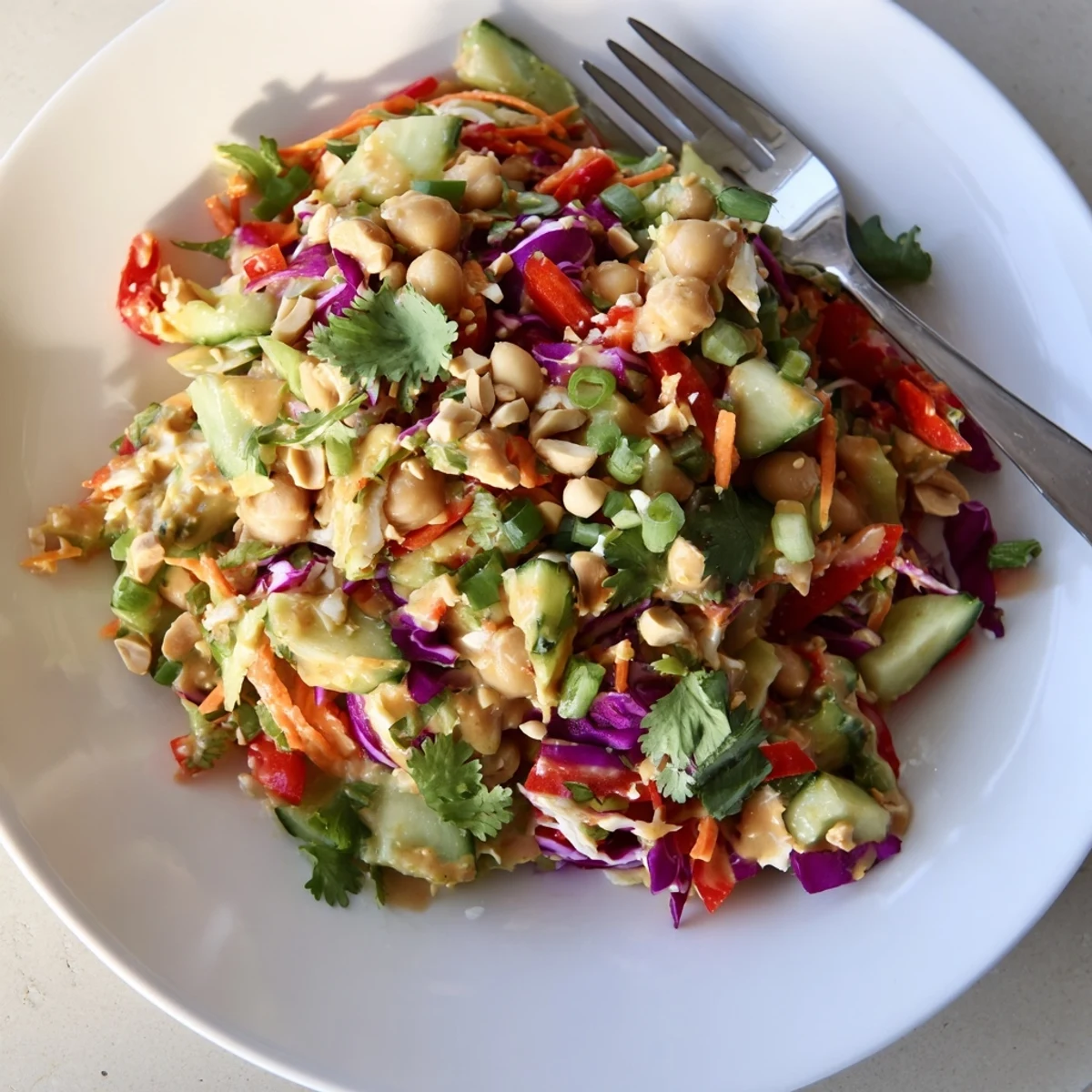 Colorful Crunchy Thai Chickpea Salad served in a bowl with fresh cilantro garnish